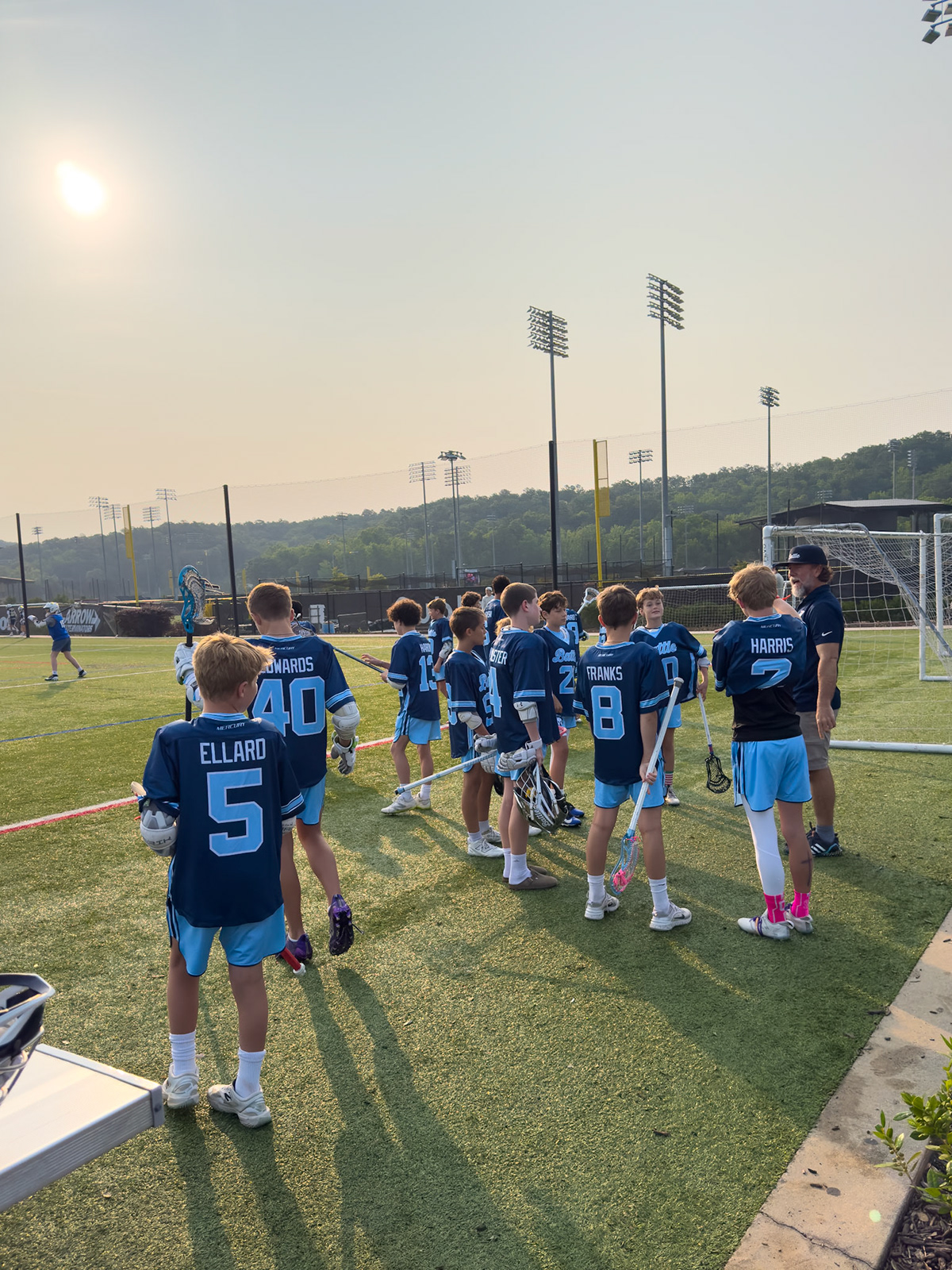 Battle LC team on field at sunset